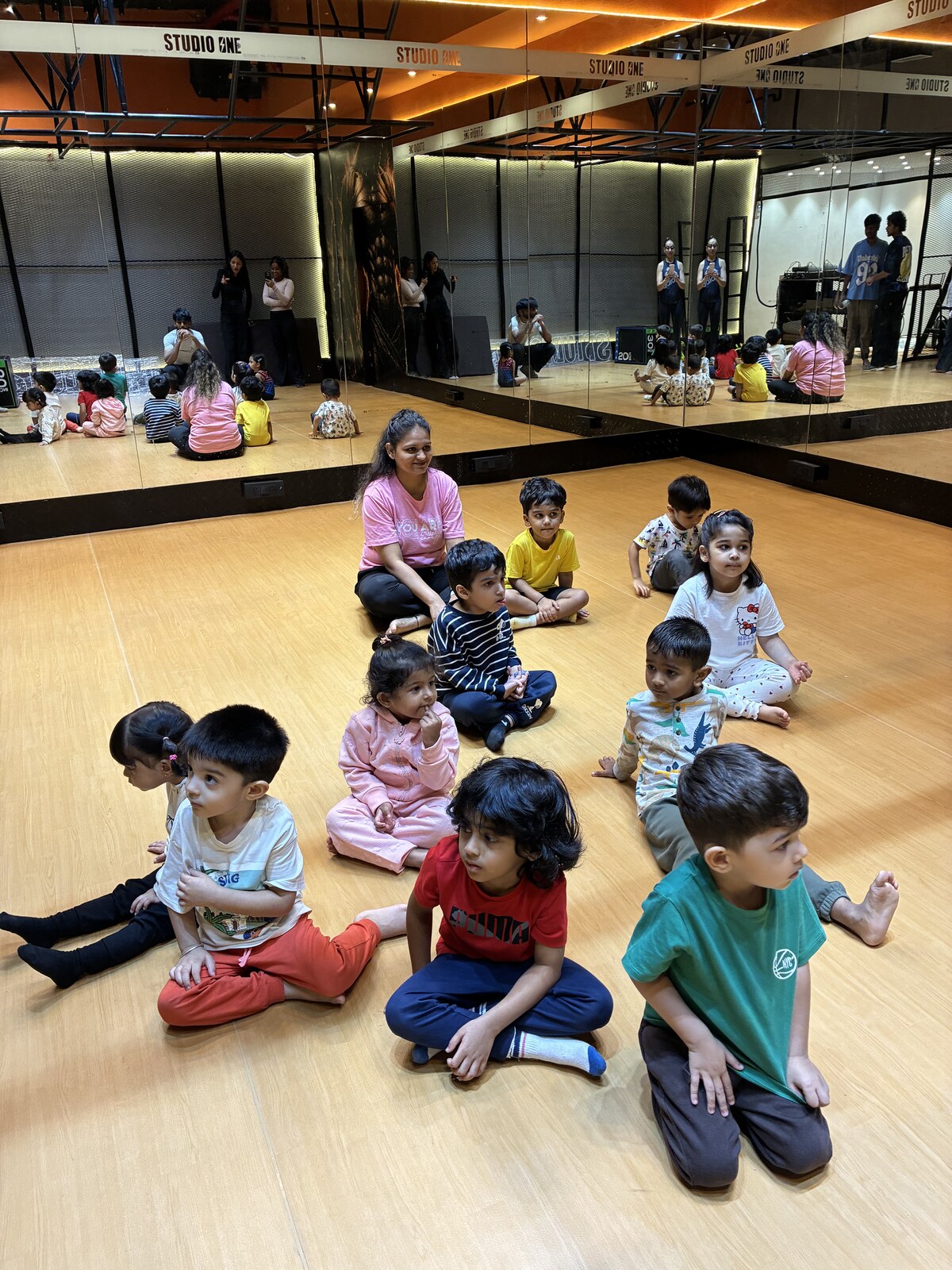 Children practising movement during a calisthenics workshop