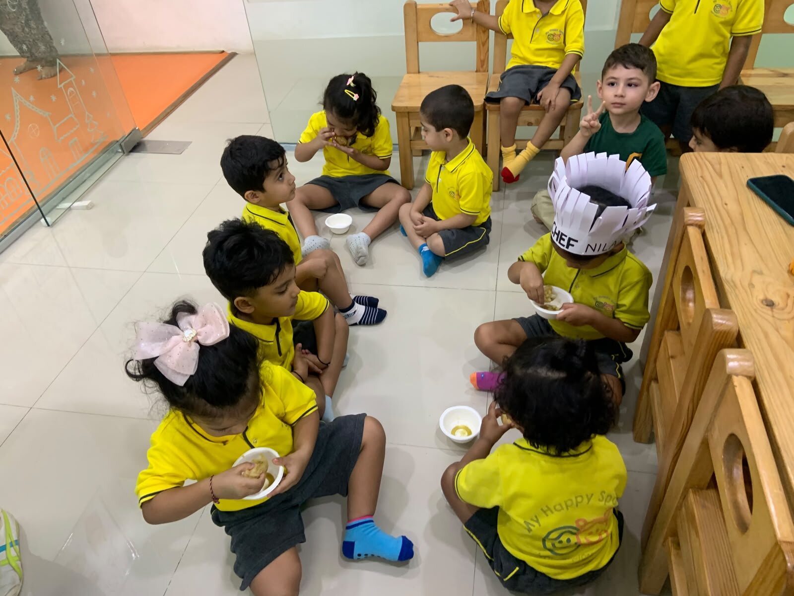 Children seated together for a small-group activity